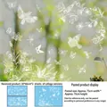Detail van raamstickers met bloemen en vlinders inclusief afmetingen voor decoratie - Witte Bloemen Vogel Vlinder Lijnkunst (CJ2614AB) / 30cmx60cm (2 vellen)