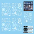 Detalle de 4 hojas de copos de nieve navideños con 119 pegatinas estáticas de ventana - Juego de 4 Hojas (21*29cm) / Calcomanías de Copos de Neve Blancos