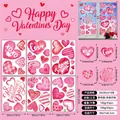 Detail van 6 vellen roze Valentijn raamstickers met hartjes en XOXO patronen - Vakantie Letter Hart Stijl (Q16) / Set van 6 (ca. 43 stuks)