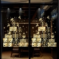Detailed golden Christmas tree window decal with reindeer and stars on glass - Combination 1
