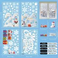 Detalle de pegatinas navideñas 3D para ventanas con motivos de Papá Noel y nieve - S25 Colección Papá Noel Azul / Multihidráulico