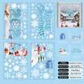 Detalle de 4 hojas de pegatinas navideñas electrostáticas 2026 con Papá Noel a doble cara - S26 Colección Año Nuevo 2026 Azul / Multihidráulico