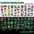 Detail of glow-in-the-dark temporary tattoos with retro gaming console and controller motifs - Luminous Game A Series