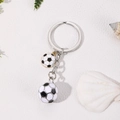 Soccer ball metal keychain with 3D pendant and flat charm on white leather background - Black and White Soccer Dual Pendant Style (Y3-174-Soccer)