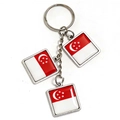 Polished silver metal keychain with three square Singapore flag pendants on white background - Singapore
