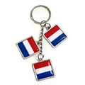 Close-up of metal keychain with three Dutch flag pendants featuring red white and blue stripes - Netherlands Style