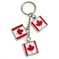 Polished metal keychain featuring three Canada flag pendants on a white background - Canada