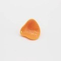 Close-up of orange silicone protective sleeve with small hanging hole and matte finish - Baseball Glove Style
