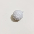 Detailed view of a white golf ball shaped keychain with realistic textured dimples - Golf Ball Style