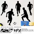 Zwarte voetballer silhouetten muurstickers met lay-out en 90x45cm display afmetingen - 30x90cm / Zwart