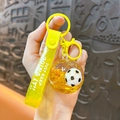 Portachiavi calcio giallo con sabbie mobili liquide e cinturino glitter per borse - Giallo