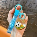 Portachiavi da calcio blu con sabbie mobili liquide e ciondolo a sfera trasparente - Blu