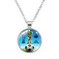 Detail shot of the 2026 World Cup mascot and trophy pattern on a round pendant necklace - 2026 World Cup Multi-Element Panoramic (62636920)