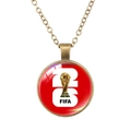 Detailed view of 2026 World Cup trophy pendant with red circular FIFA design - Red Number 26 and Trophy (62637008)