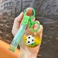 Creative soccer keychain with yellow liquid quicksand and green silicone wristband - Green