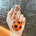 Orange and black football keychain with a glossy finish and metal ring for sports fans - Single Pendant Style / Orange