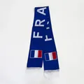 Detail of blue France football fan scarf featuring FRA text and white fringe tassels - France Style