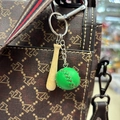 Miniature wooden baseball bat and green tennis ball keychain hanging on a backpack - 2cm Green Ball 4.5cm Short Bat