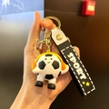 Portachiavi da calcio a cartoni con cuffie e cinturino sportivo nero e bianco - Stile Cuffie Bianco e Nero