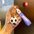 Cartoon soccer player keychain with blue jersey and Sport wristband strap - World Wave Blue Style