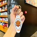 Macro view of a diamond-shaped basketball keychain with Fire and Ball Is Life text - White Sports - Basketball