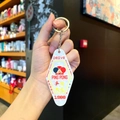 Macro view of retro diamond-shaped acrylic table tennis keychain with sporty ping pong graphics - Pearl Marble - Ping Pong