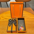 Detail of soccer ball keychain with global flags in an orange luxury gift box set - National Flag Soccer Ball + Lobster Clasp + Gift Box + Gift Bag