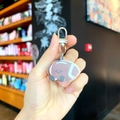 Llavero de fútbol americano lindo de acrílico rosa con purpurina y cierre plateado - Balón de rugby