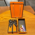 Miniature soccer keychain with world flags in orange gift box and matching carrier bag - Flag Soccer Ball + Gold Trophy + Sign + Gift Box + Bag