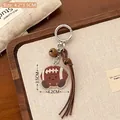 Porte-clés rugby en acrylique avec emoji mignon et dragonne à pompon marron - Ballon de rugby