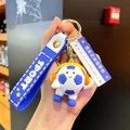 Cartoon soccer keychain with orange headphones and blue sport wrist strap charm - Dark Blue Headphone Style (With Sign)