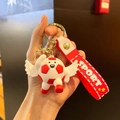 Cartoon football character keychain with red sport strap and white wings pendant - Angel Red Style