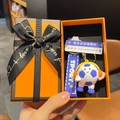 Cartoon soccer doll keychain in gift box with headset and blue sport wrist strap - Dark Blue Headphone Style With Sign and Box