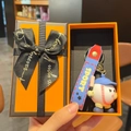 Funny cartoon baseball keychain with blue cap and silicone wristlet in orange gift box - Baseball Style + Orange Gift Box