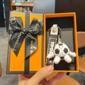 Soccer ball plush keychain with SPORT strap in an elegant orange gift box with bow - Football Style + Orange Gift Box