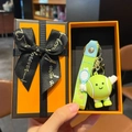 Funny green tennis ball cartoon plush keychain in an orange luxury gift box set - Tennis Style + Orange Gift Box