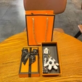 Cartoon soccer keychain gift set featuring white leather sport wristlet in orange box - Football Style + Gift Box & Bag