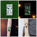 Leuchtende Fußball-Tattoo-Sticker mit grünem Glow-Effekt und Pokal-Motiven für Sportevents - Fußball-Stil (Ei-330)
