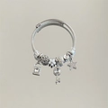 Detail view of silver stainless steel charm bracelet with star key lock charms and beads - Silver White Star Key Rhinestone Bracelet