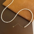 Elegant white rice-shaped freshwater pearl necklace with a gold heart charm and extender - 2-5#18 Pearl Necklace White 4-5mm