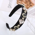 Cerchietto barocco in velluto nero con cuori di cristallo e fiori dorati eleganti - Nero