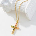 Gold-plated cross pendant necklace featuring colorful zircon stones on white marble stand - Gold/Multicolor Gem Religious Cross/O1