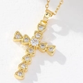 Gold-plated cross necklace with white zircon stones on a white textured surface - Gold/Segmented White Zirconia Cross/X1
