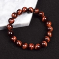 8mm Red Tiger Eye beaded bracelet with polished natural stone and cat eye effect - Red