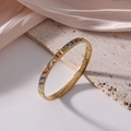 6mm gold-plated titanium bangle with vibrant red and blue enamel geometric patterns - Modern Geometric Stripes (J11)