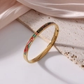Golden titanium steel bangle with colorful enamel geometric patterns and a secure side clasp - Geometric Scroll Pattern (J13)