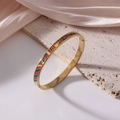 6mm gold titanium bracelet featuring colorful burgundy and green enamel geometric patterns - Geometric Art Color Blocks (J15)