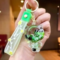 Green panda liquid quicksand keychain with Happy Moments silicone strap and gold clasp - [big Head Bear] Translucent Green Bamboo Panda