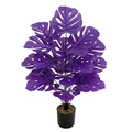 Close-up of artificial purple monstera leaves with black pot and natural pebbles decor - Large 18-Head Purple Monstera (Without Pot)