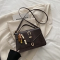 Minimalist dark brown crocodile pattern crossbody bag with a vintage bead pendant - With Pendant / Brown